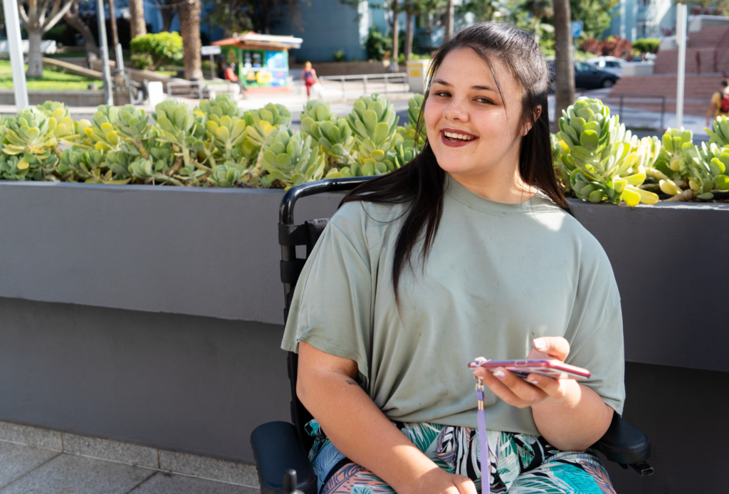 Image of a young woman in a wheelchair